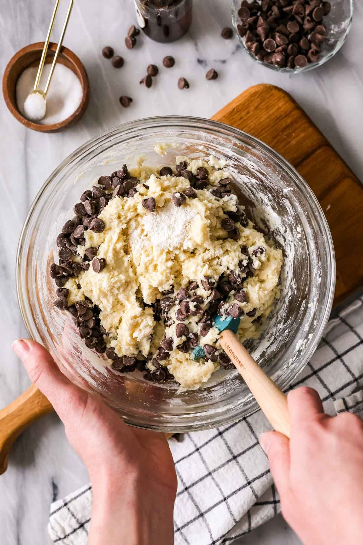 Overhead view of a bowl of muffin batter that's been 50% combined.