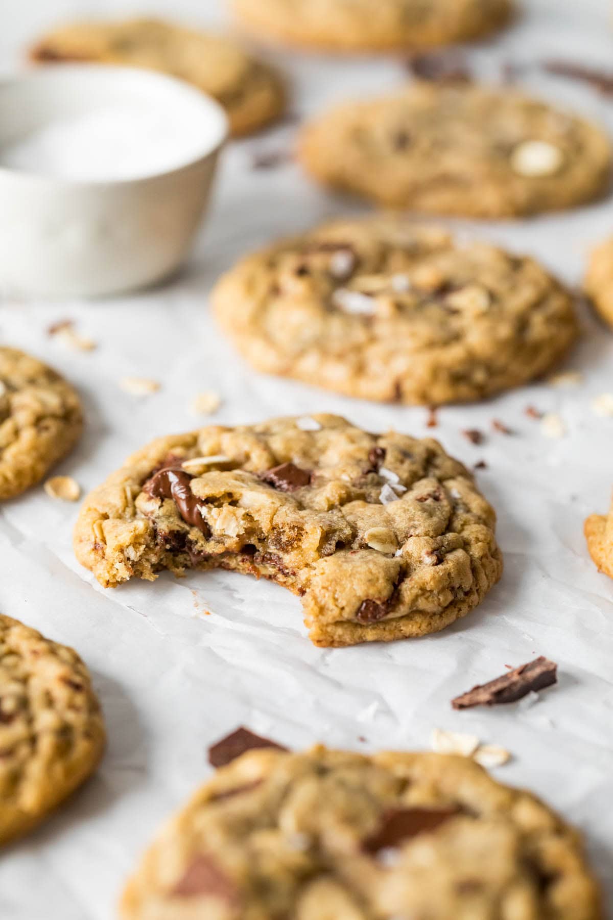 Bite missing from a choc-oat-chip cookie.