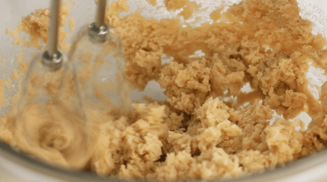 Close-up view of creamed butters and sugars.