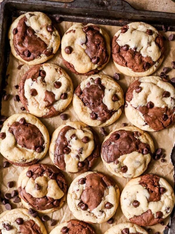 Overhead view of brookie cookies on a baking sheet.