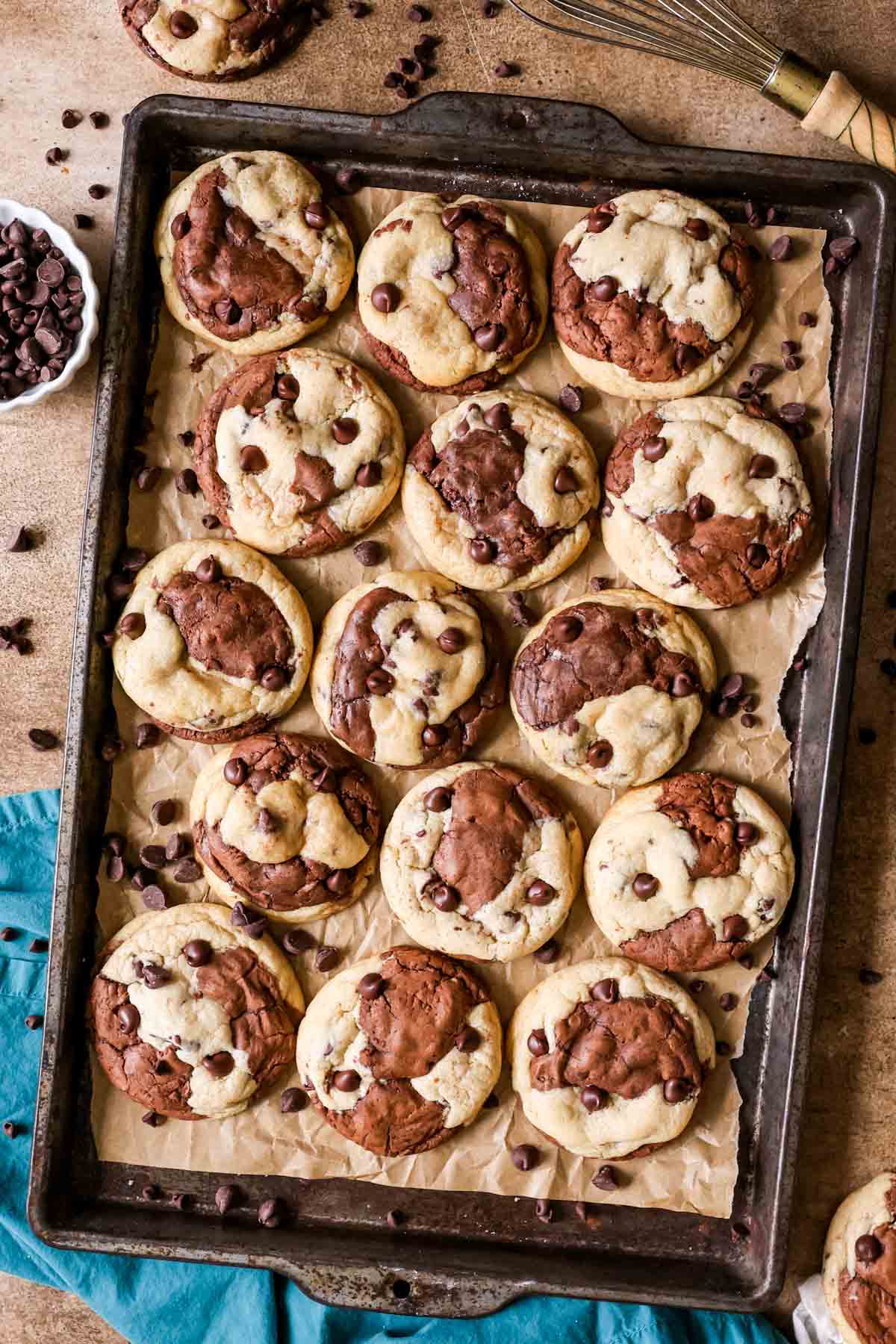 Overhead view of brookie cookies on a baking sheet.