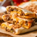Stack of three cheeseburger quesadillas.