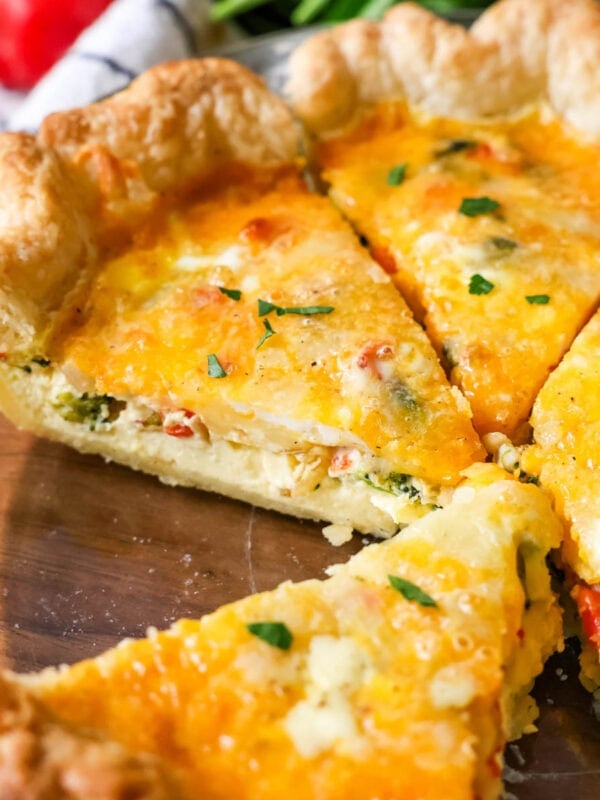 Slices of quiche in a pie plate.