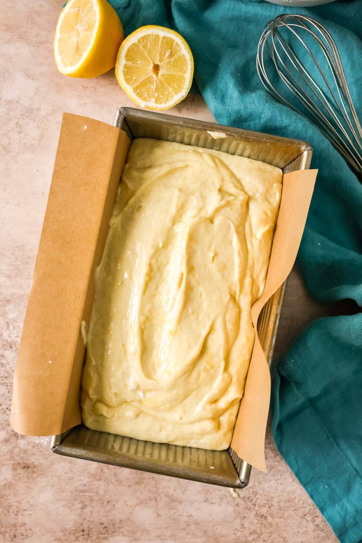 Overhead view of lemon loaf batter in its pan before baking.