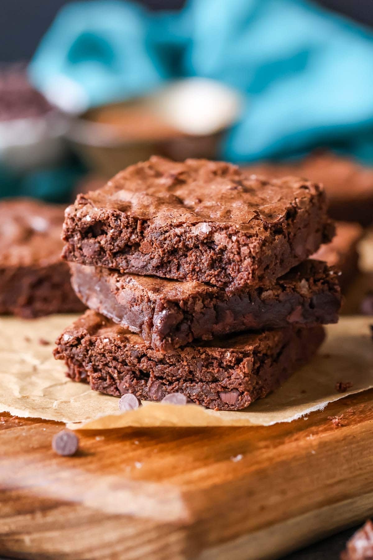 Stack of three brownies made with cocoa powder instead of melted chocolate.