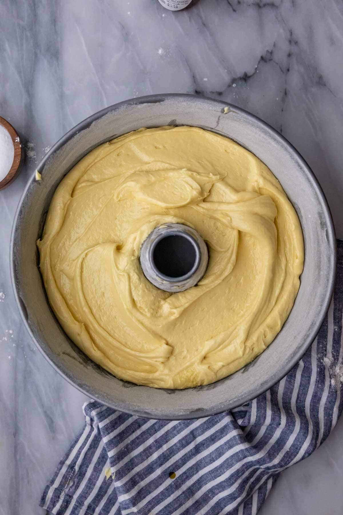 Pound cake batter in a greased and floured tube pan.