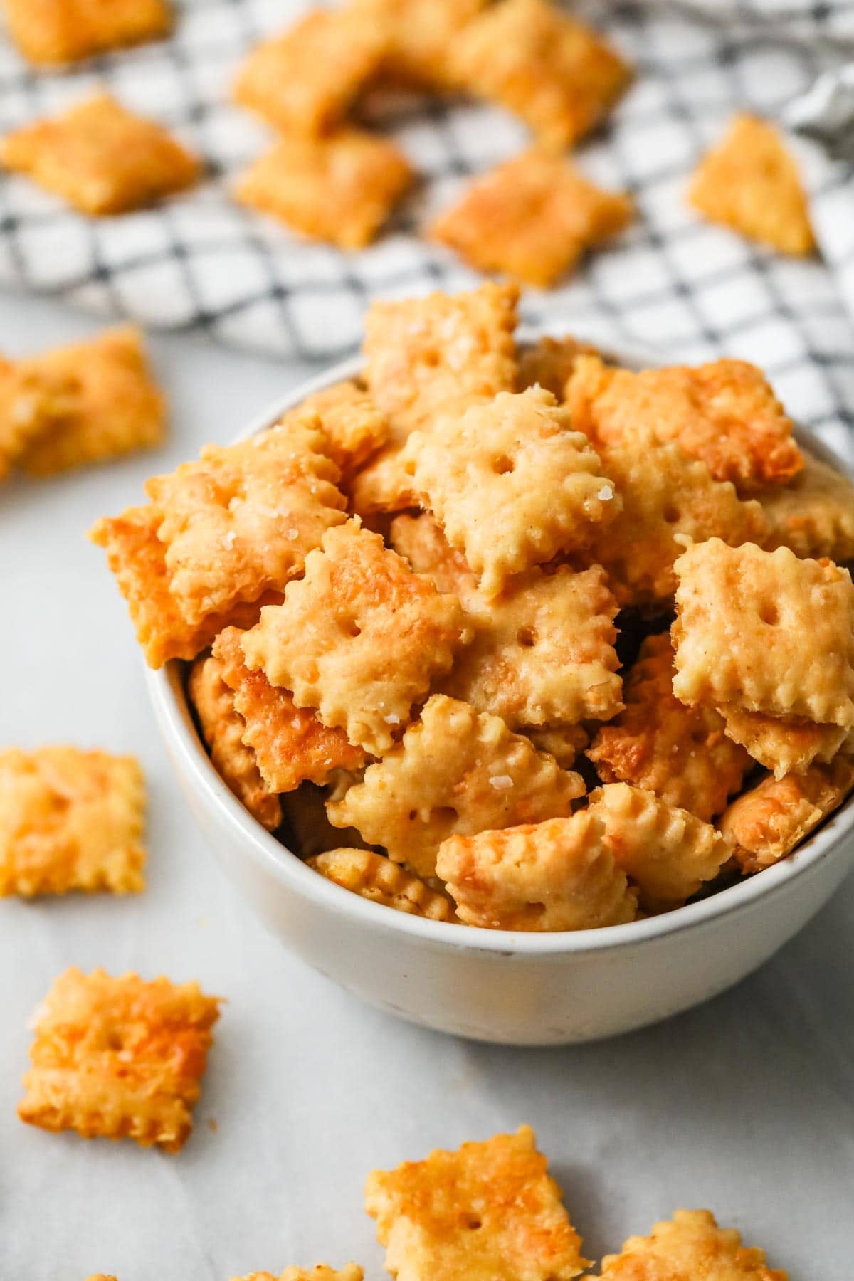 Bowl of homemade cheese crackers made with sourdough discard.