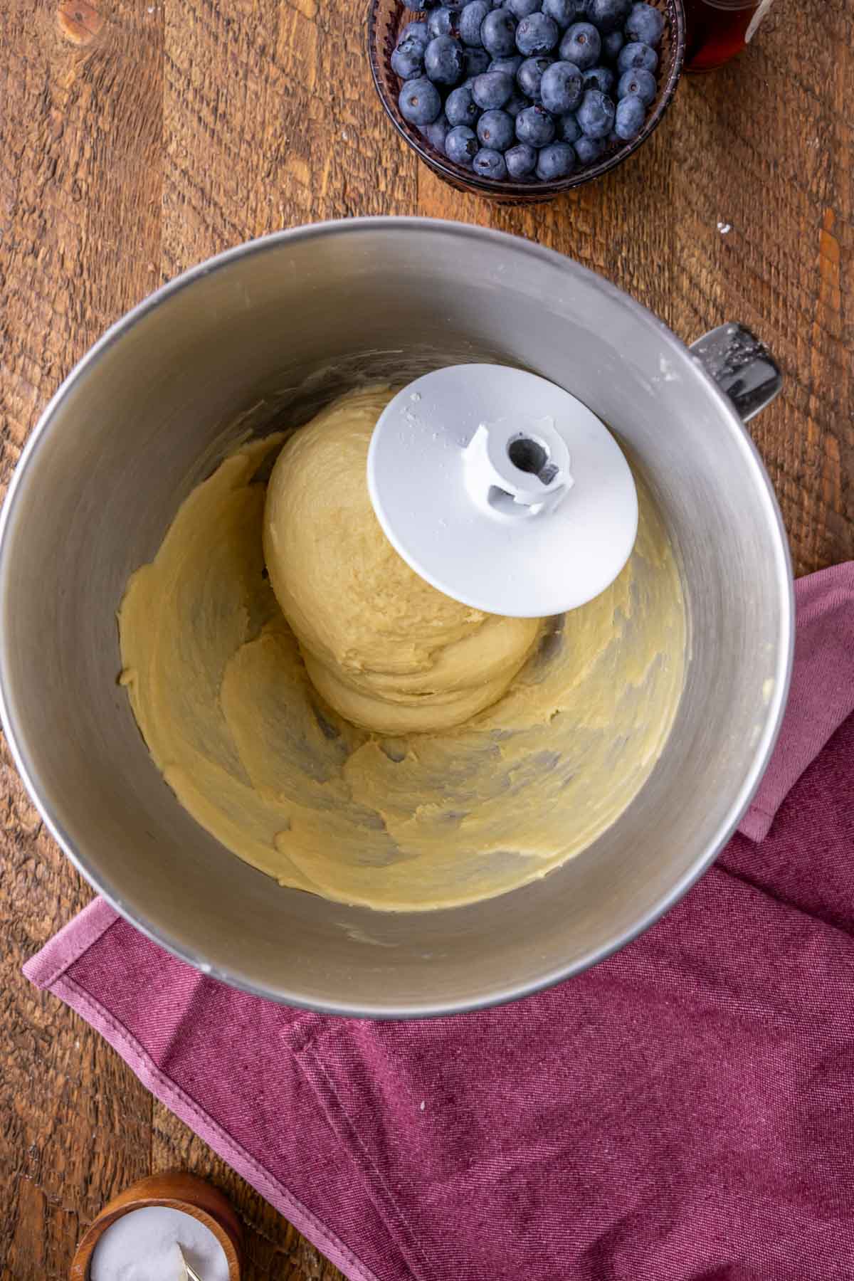Overhead view of smooth and elastic dough after being kneaded with a dough hook.