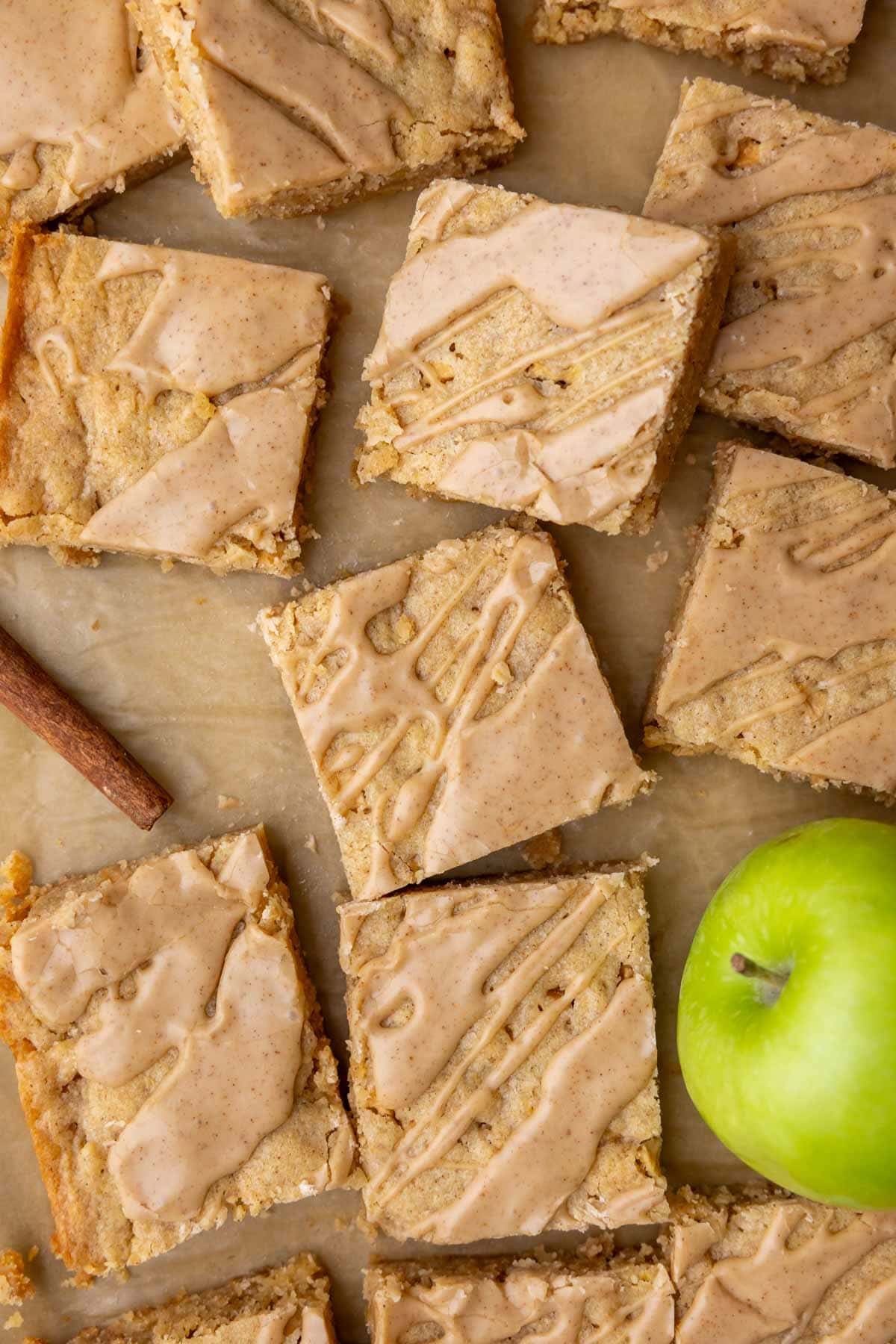 Overhead view of blondies made with apples and a cinnamon maple glaze.