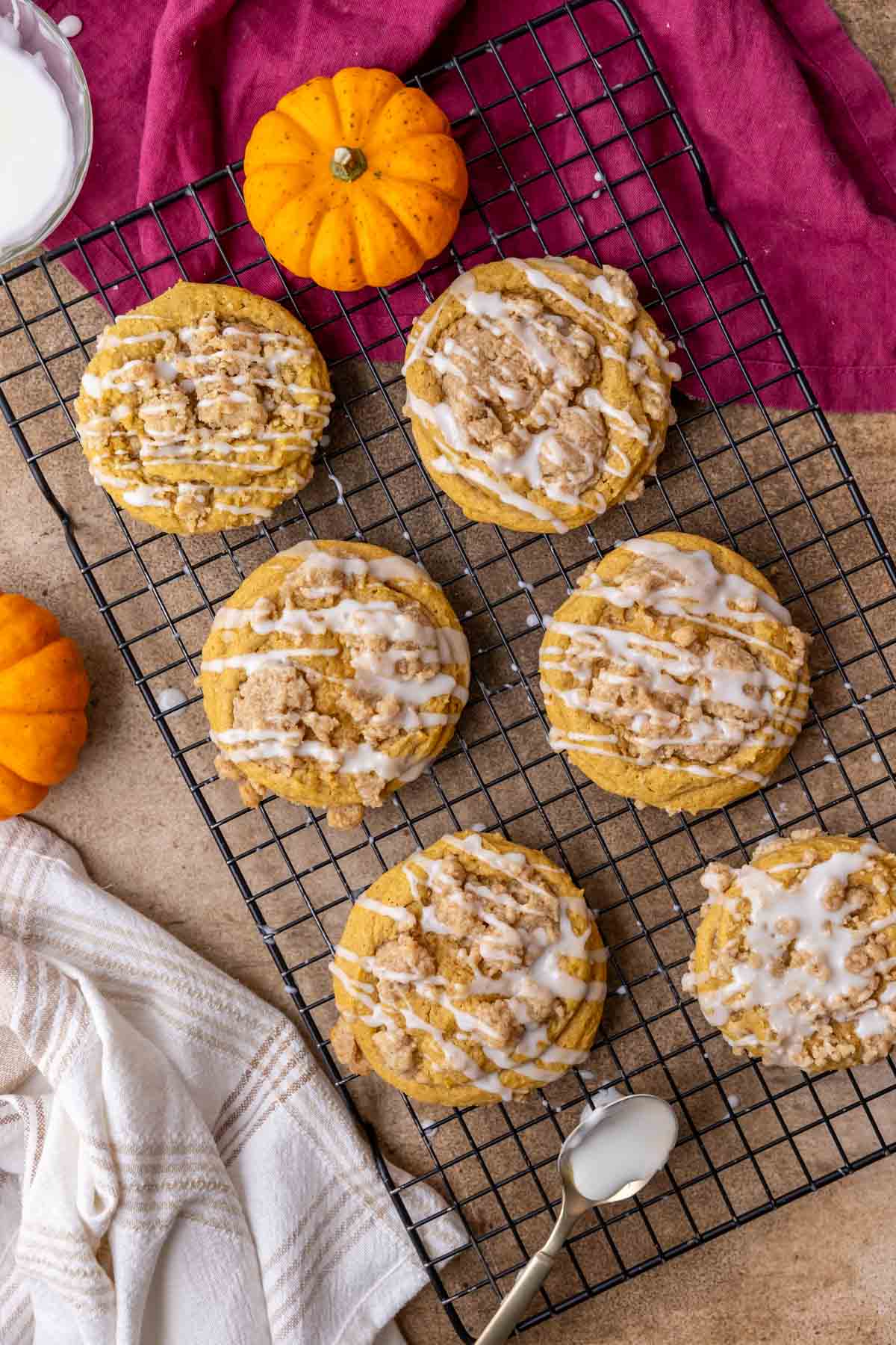 Overhead view of pumpkin streusel cookies that have been drizzled with glaze.