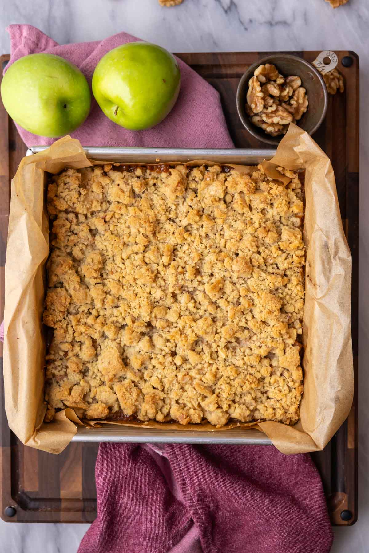 Overhead view of a pan of apple pie bars after baking.